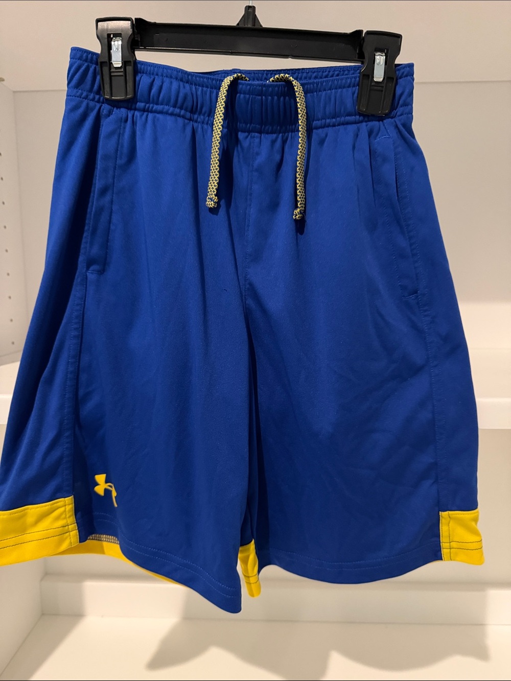 Under Armour Royal Blue Athletic Shorts with Yellow Accents. Youth Medium